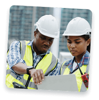 HVAC workers looking at a laptop