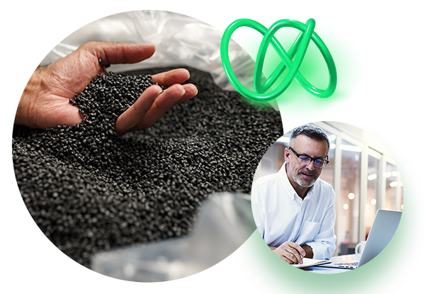 Hand holding polymer particles and man looking at computer