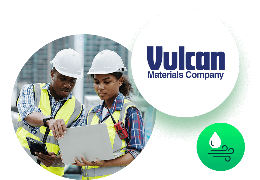 HVAC workers looking at laptop